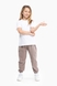 Спортивные штаны детские Toontoy 22963 122 см Бежевый (2000989639411D) Фото 2 из 10