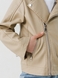 Куртка з екошкіри для дівчинки XZKAMI 6807 134 см Бежевий (2000990537959D) Фото 4 з 13