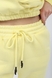 Спортивні штани жіночі MDG 125701-2 S Жовтий (2000989382614W) Фото 1 з 7